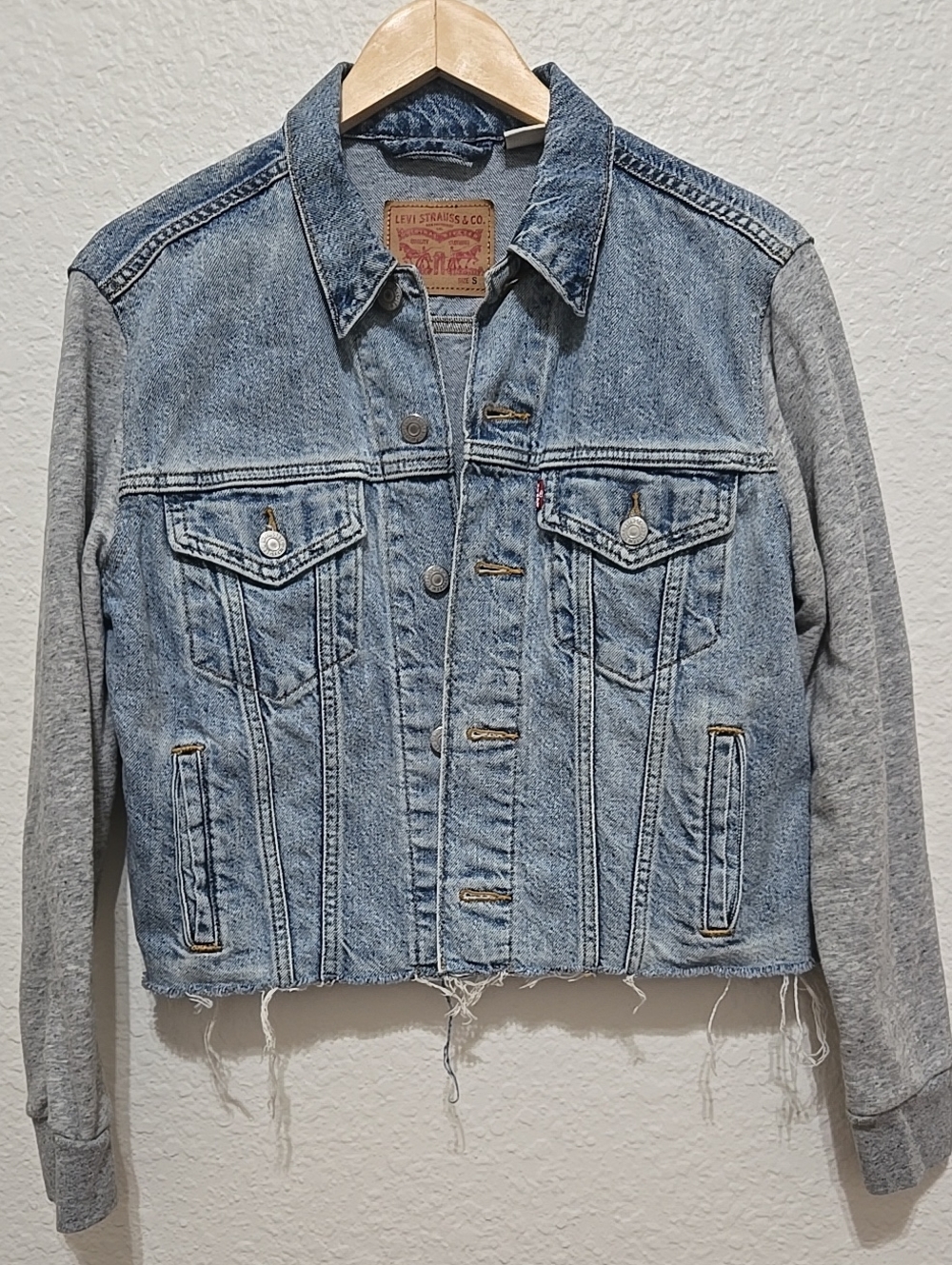 Levi's Distressed CroppedLight Blue Denim Trucker with Heather Gray Knit Sleeves